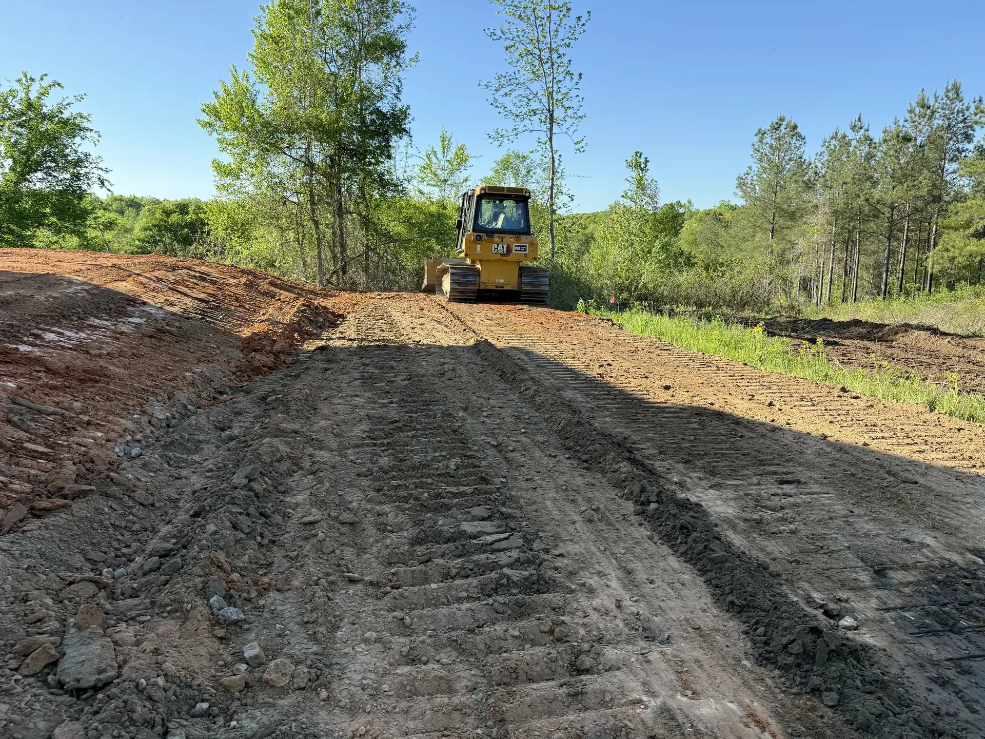 Dozer grading an East Alabama access road