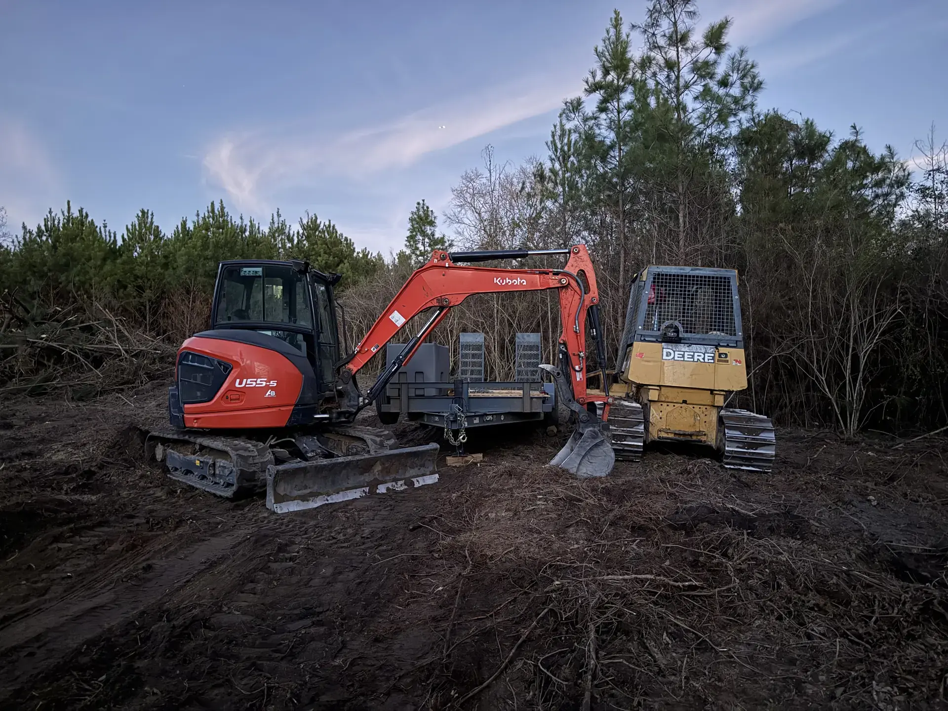 Excavator and dozer working together on property preparation